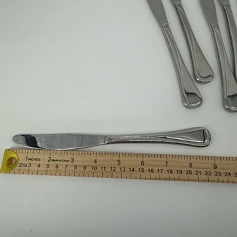 Oneida Flight Reliance Glossy Stainless Dinner‎ Knives Set of 7 9 Inch Serrated